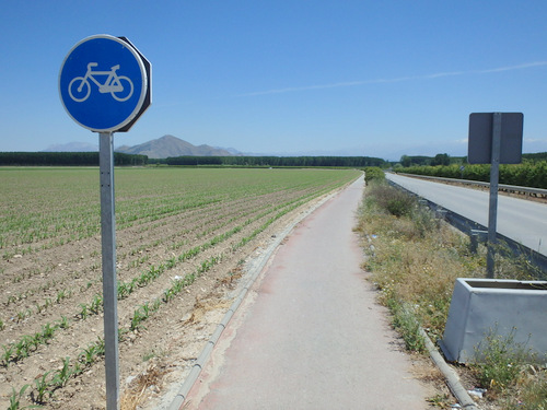 We happen upon a bicycle trail next to the road.